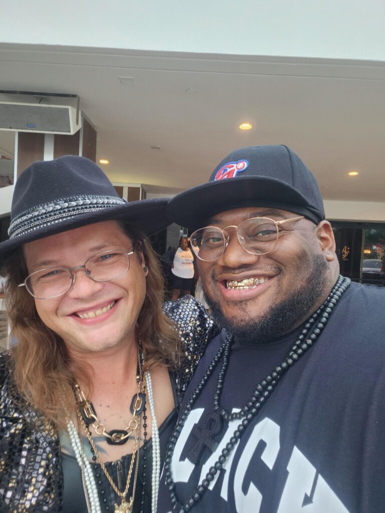 Alliance members smile with excitement.